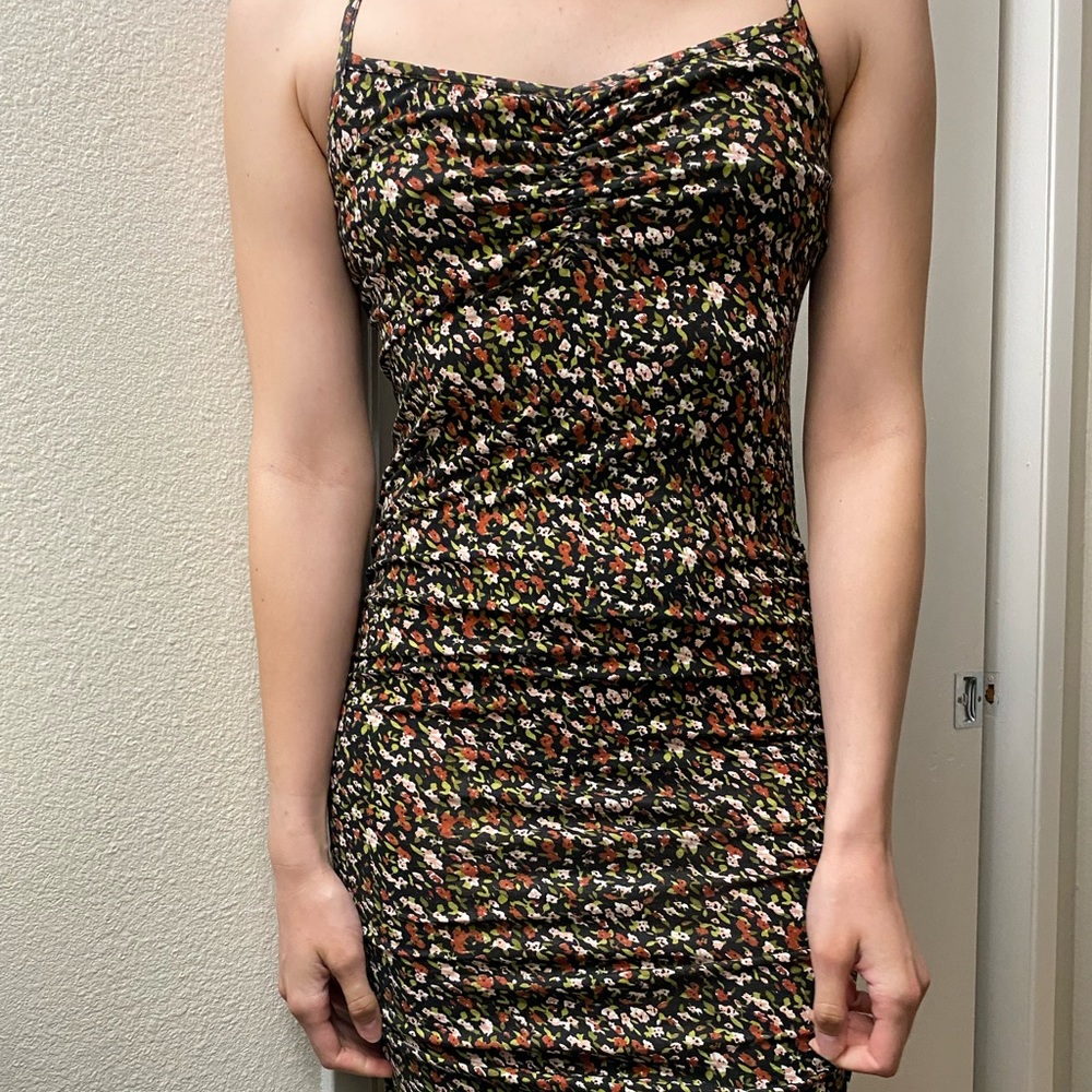 Long floral bodycon dress.